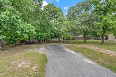 Immaculate home on 3 wooded lots in highly sought-after gated on Holly Lake Ranch Golf Club in Texas - for sale on GolfHomes.com, golf home, golf lot