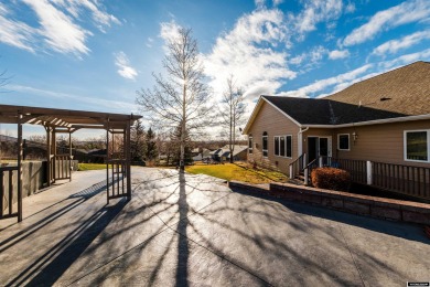 Beautiful custom home that overlooks the golf course & the city on Buffalo Golf Club in Wyoming - for sale on GolfHomes.com, golf home, golf lot