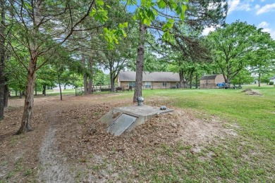 Immaculate home on 3 wooded lots in highly sought-after gated on Holly Lake Ranch Golf Club in Texas - for sale on GolfHomes.com, golf home, golf lot