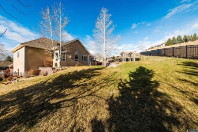 Beautiful custom home that overlooks the golf course & the city on Buffalo Golf Club in Wyoming - for sale on GolfHomes.com, golf home, golf lot