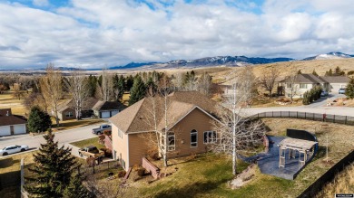 Beautiful custom home that overlooks the golf course & the city on Buffalo Golf Club in Wyoming - for sale on GolfHomes.com, golf home, golf lot