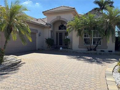 Singular lot with sweeping lake and golf course views behind AND on Herons Glen Golf and Country Club in Florida - for sale on GolfHomes.com, golf home, golf lot