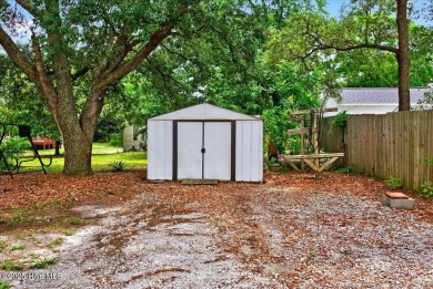 This  two bedroom, two bath home located in the sought after on Oyster Bay Golf Links in North Carolina - for sale on GolfHomes.com, golf home, golf lot