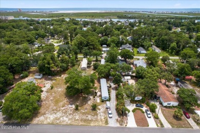 This  two bedroom, two bath home located in the sought after on Oyster Bay Golf Links in North Carolina - for sale on GolfHomes.com, golf home, golf lot