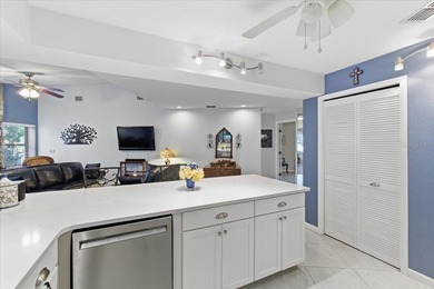 Located in the highly desirable Pine Lakes Golf Community with on The Grand Club - Pine Lakes Course in Florida - for sale on GolfHomes.com, golf home, golf lot