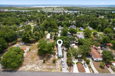 This  two bedroom, two bath home located in the sought after on Oyster Bay Golf Links in North Carolina - for sale on GolfHomes.com, golf home, golf lot