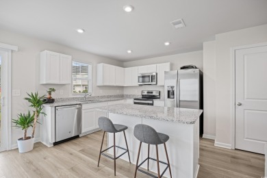 Welcome to this stunning 3-bedroom, 2.5-bath end-unit on Arrowhead Country Club in South Carolina - for sale on GolfHomes.com, golf home, golf lot