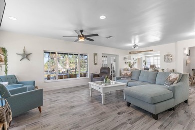 Step inside and exhale--from morning coffee by the pool to on Palm Harbor Golf Club in Florida - for sale on GolfHomes.com, golf home, golf lot