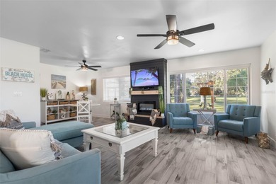 Step inside and exhale--from morning coffee by the pool to on Palm Harbor Golf Club in Florida - for sale on GolfHomes.com, golf home, golf lot