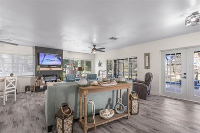 Step inside and exhale--from morning coffee by the pool to on Palm Harbor Golf Club in Florida - for sale on GolfHomes.com, golf home, golf lot