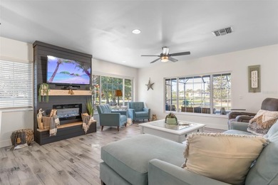 Step inside and exhale--from morning coffee by the pool to on Palm Harbor Golf Club in Florida - for sale on GolfHomes.com, golf home, golf lot