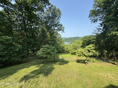Stunning Log Cabin style Retreat on Norris Lake - Community on The Greens at Deerfield in Tennessee - for sale on GolfHomes.com, golf home, golf lot