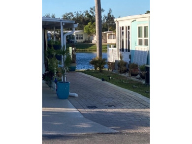 Experience the freedom of NO LOT Rent.

Welcome to your dream on Pelican Pointe Golf and Country Club in Florida - for sale on GolfHomes.com, golf home, golf lot