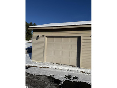 Green Meadows Condominiums ground-floor unit in a rare two-story on Bay Meadows Golf Course - Executive in Michigan - for sale on GolfHomes.com, golf home, golf lot