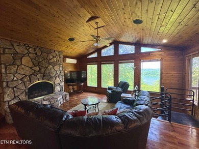 Stunning Log Cabin style Retreat on Norris Lake - Community on The Greens at Deerfield in Tennessee - for sale on GolfHomes.com, golf home, golf lot