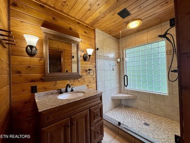 Stunning Log Cabin style Retreat on Norris Lake - Community on The Greens at Deerfield in Tennessee - for sale on GolfHomes.com, golf home, golf lot
