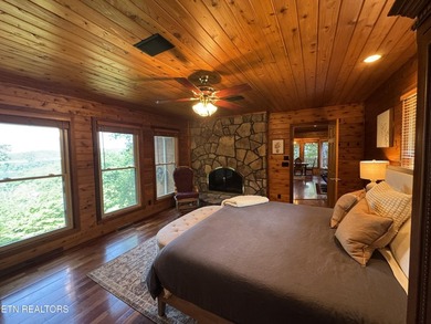 Stunning Log Cabin style Retreat on Norris Lake - Community on The Greens at Deerfield in Tennessee - for sale on GolfHomes.com, golf home, golf lot