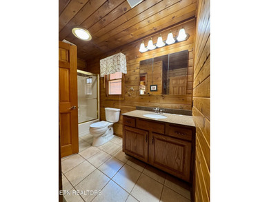 Stunning Log Cabin style Retreat on Norris Lake - Community on The Greens at Deerfield in Tennessee - for sale on GolfHomes.com, golf home, golf lot