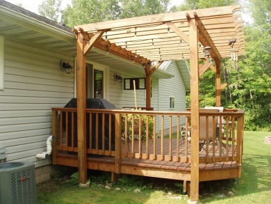 (351/PB) Cherry! Best describes this 3-bedroom, 2-bath home on on Prentice Golf Club in Wisconsin - for sale on GolfHomes.com, golf home, golf lot