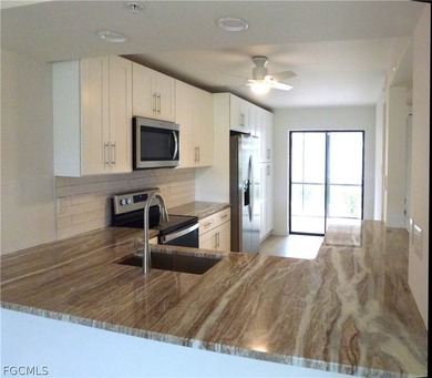 This 2 bedroom + den 2 bathroom condo on the 1st floor is on  in Florida - for sale on GolfHomes.com, golf home, golf lot