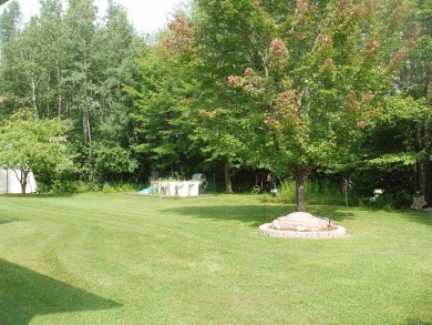 (351/PB) Cherry! Best describes this 3-bedroom, 2-bath home on on Prentice Golf Club in Wisconsin - for sale on GolfHomes.com, golf home, golf lot
