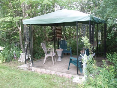 (351/PB) Cherry! Best describes this 3-bedroom, 2-bath home on on Prentice Golf Club in Wisconsin - for sale on GolfHomes.com, golf home, golf lot