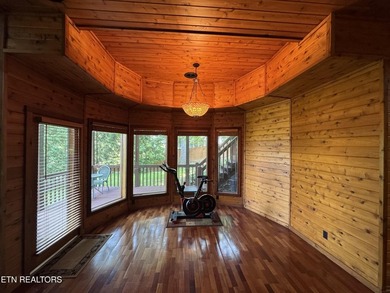 Stunning Log Cabin style Retreat on Norris Lake - Community on The Greens at Deerfield in Tennessee - for sale on GolfHomes.com, golf home, golf lot