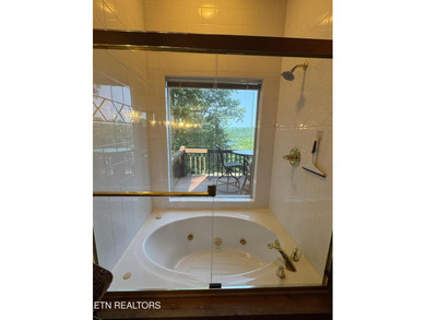 Stunning Log Cabin style Retreat on Norris Lake - Community on The Greens at Deerfield in Tennessee - for sale on GolfHomes.com, golf home, golf lot