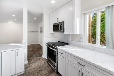 Welcome to this beautifully updated ground-level, end-unit condo on La Costa Resort and Spa in California - for sale on GolfHomes.com, golf home, golf lot