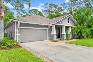 Welcome Home to your private oasis nestled along a peaceful on Plantation Bay Golf and Country Club in Florida - for sale on GolfHomes.com, golf home, golf lot