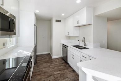 Welcome to this beautifully updated ground-level, end-unit condo on La Costa Resort and Spa in California - for sale on GolfHomes.com, golf home, golf lot