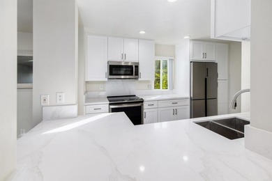 Welcome to this beautifully updated ground-level, end-unit condo on La Costa Resort and Spa in California - for sale on GolfHomes.com, golf home, golf lot