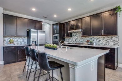 STUNNING Meritage built corner lot home located in the highly on The Tribute At the Colony in Texas - for sale on GolfHomes.com, golf home, golf lot