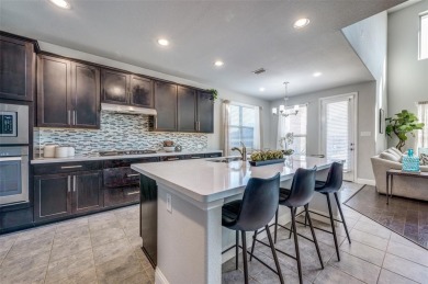 STUNNING Meritage built corner lot home located in the highly on The Tribute At the Colony in Texas - for sale on GolfHomes.com, golf home, golf lot