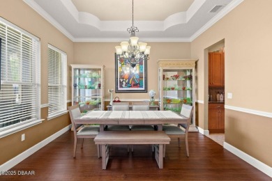 Welcome Home to your private oasis nestled along a peaceful on Plantation Bay Golf and Country Club in Florida - for sale on GolfHomes.com, golf home, golf lot
