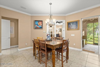 Welcome Home to your private oasis nestled along a peaceful on Plantation Bay Golf and Country Club in Florida - for sale on GolfHomes.com, golf home, golf lot