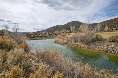 Enjoy serene mountain living with golf course and lake views in on Gypsum Creek Golf Course in Colorado - for sale on GolfHomes.com, golf home, golf lot