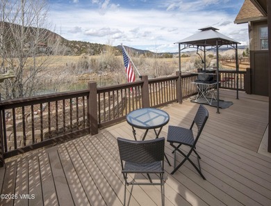 Enjoy serene mountain living with golf course and lake views in on Gypsum Creek Golf Course in Colorado - for sale on GolfHomes.com, golf home, golf lot