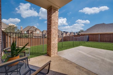 STUNNING Meritage built corner lot home located in the highly on The Tribute At the Colony in Texas - for sale on GolfHomes.com, golf home, golf lot