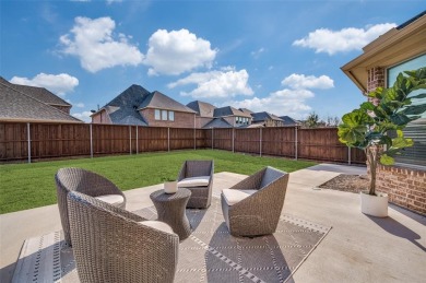 STUNNING Meritage built corner lot home located in the highly on The Tribute At the Colony in Texas - for sale on GolfHomes.com, golf home, golf lot