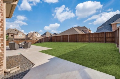 STUNNING Meritage built corner lot home located in the highly on The Tribute At the Colony in Texas - for sale on GolfHomes.com, golf home, golf lot