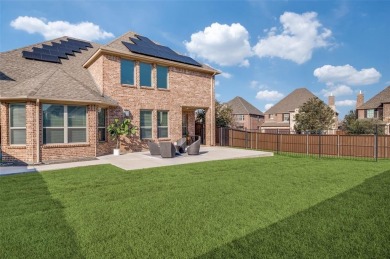 STUNNING Meritage built corner lot home located in the highly on The Tribute At the Colony in Texas - for sale on GolfHomes.com, golf home, golf lot