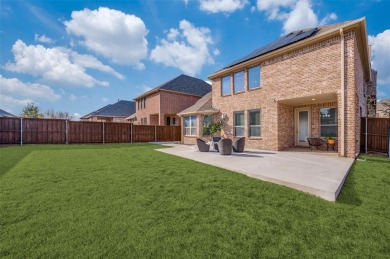 STUNNING Meritage built corner lot home located in the highly on The Tribute At the Colony in Texas - for sale on GolfHomes.com, golf home, golf lot