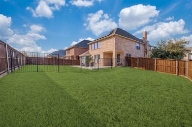 STUNNING Meritage built corner lot home located in the highly on The Tribute At the Colony in Texas - for sale on GolfHomes.com, golf home, golf lot