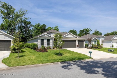 Welcome to your dream home in the prestigious Halifax Plantation on Halifax Plantation Golf Club in Florida - for sale on GolfHomes.com, golf home, golf lot