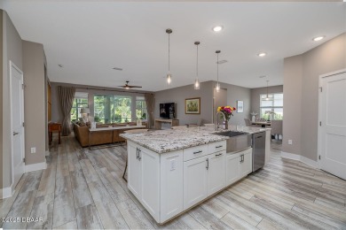 Welcome to your dream home in the prestigious Halifax Plantation on Halifax Plantation Golf Club in Florida - for sale on GolfHomes.com, golf home, golf lot