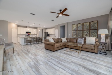 Welcome to your dream home in the prestigious Halifax Plantation on Halifax Plantation Golf Club in Florida - for sale on GolfHomes.com, golf home, golf lot