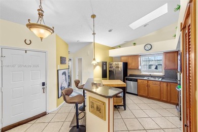This beautiful 2-bedroom, 2-bathroom townhome features vaulted on Woodmont Country Club in Florida - for sale on GolfHomes.com, golf home, golf lot