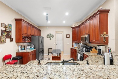 Located in Lake Ashton, this home combines practicality with on Lake Ashton Golf Club in Florida - for sale on GolfHomes.com, golf home, golf lot