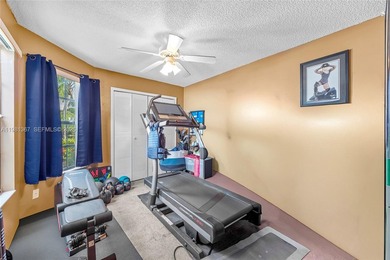 This beautiful 2-bedroom, 2-bathroom townhome features vaulted on Woodmont Country Club in Florida - for sale on GolfHomes.com, golf home, golf lot